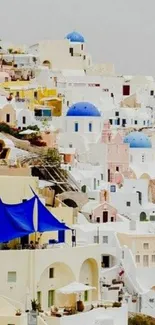 Santorini's iconic blue domes and white buildings.