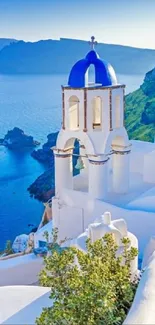 Santorini's iconic blue domes with Aegean Sea backdrop.