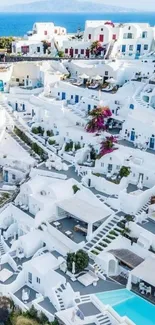 Santorini white buildings and blue sea in a picturesque view.