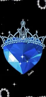 Royal blue heart with jeweled crown on black background mobile wallpaper.