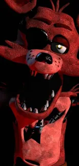 Scary red animatronic fox on dark background wallpaper.