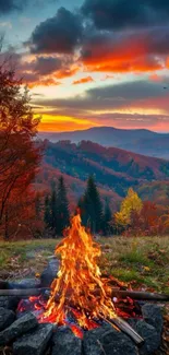 Autumn campfire with scenic mountain sunset.