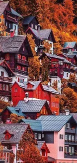 Charming autumn village with vibrant hues and colorful houses on a hillside.