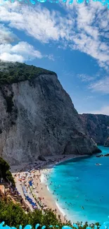 Pristine beach with azure waters and dramatic cliffs under a blue sky.