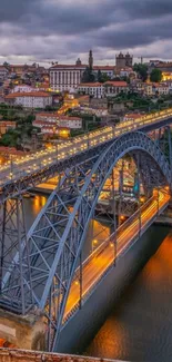 Panoramic cityscape with bridge and river at night.