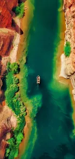 Aerial view of a teal river flowing through a vibrant canyon landscape.