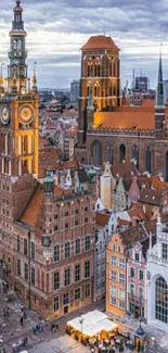 Aerial view of a historic city with stunning orange rooftops and classic architecture.