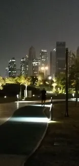 Night cityscape with skyscrapers and walkway in park.