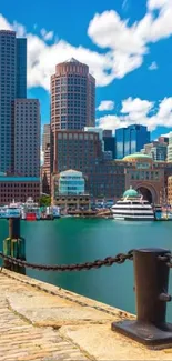 Scenic view of city skyline with skyscrapers by the waterfront under a vibrant blue sky.