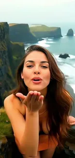 Woman enjoying scenic cliffside view.