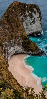 Scenic view of a beach with blue ocean and lush coastal cliffs.