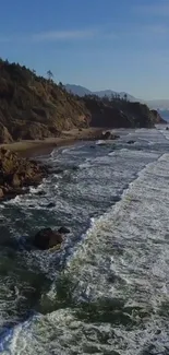 Scenic view of rocky coastline and ocean waves.