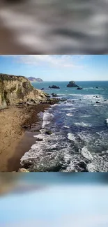 Scenic coastal beach with ocean waves and rugged cliffs under a clear sky.