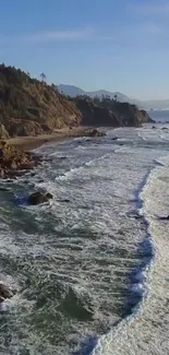 Scenic view of a coastal beach with waves.