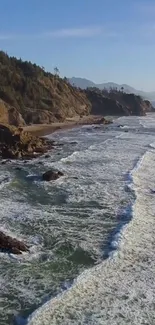 A scenic view of the ocean waves crashing along a rugged coastline.