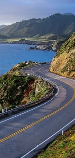 Beautiful coastal road winding through lush hills with ocean view.