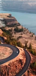 A stunning coastal road winding through rocky cliffs with ocean views.