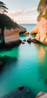 Scenic view of coastal caves with turquoise water and lush green trees.