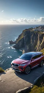 Red SUV parked on a scenic cliff with ocean view.