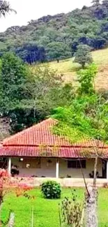 A countryside house amid lush green hills.