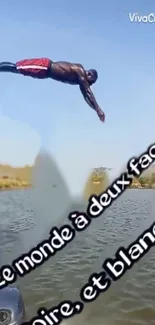 Person diving into a calm lake on a sunny day, under a blue sky.