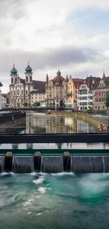 Scenic view of a European cityscape with a river and historic buildings.