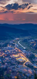 A scenic evening cityscape with vibrant lights and a winding river.