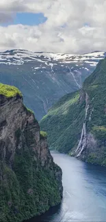 Stunning fjord landscape with lush green mountains and a serene waterway.