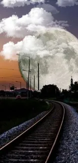 Railway leading to a giant full moon under a dark blue evening sky.