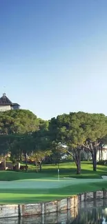 Scenic golf course with trees and blue sky.