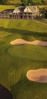 Serene aerial view of a lush golf course with water features and rolling hills.