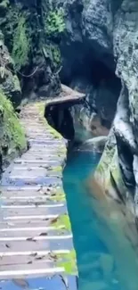 Tranquil gorge wooden walkway with blue waters and lush greenery.