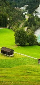 Scenic green valley landscape with a river and cottages.