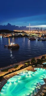 Nighttime harbor view with city lights reflecting on water and glowing pool.