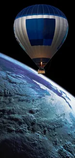 Hot air balloon floating over a planet's surface in dark blue hues.