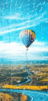 Hot air balloon over a winding road and blue sky.