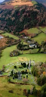 Aerial view of lush Irish countryside with fields and hills.