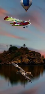 Island with airplane and balloon at sunset.