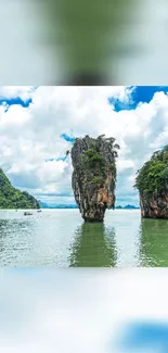 Scenic island with rock formation and ocean backdrop.