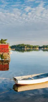 Lake house reflection with blue sky and serene water.