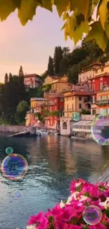 Colorful lakeside village at sunset with bubbles and vibrant flowers.