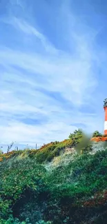 Scenic view of a lighthouse with lush greenery and a clear blue sky.