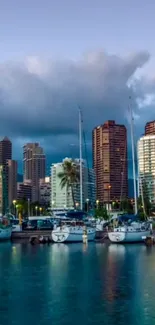 Marina cityscape with boats and skyscrapers at dusk, under a cloudy sky.