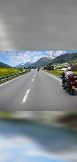 Motorbike on scenic road with mountain views.