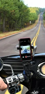 Motorcycle journey through a scenic forest roadway.