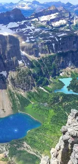 Breathtaking mountain view with blue lakes and lush greenery.