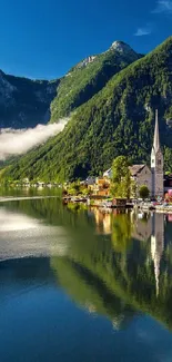 Scenic view of a lakeside village with mountains and reflecting waters.