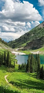 Scenic mountain lake with greenery and clouds, perfect for mobile wallpaper.