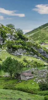 Scenic view of a mountain lake surrounded by lush greenery and rocky hills.