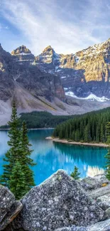 Scenic mountain lake with forest and rocky peaks.